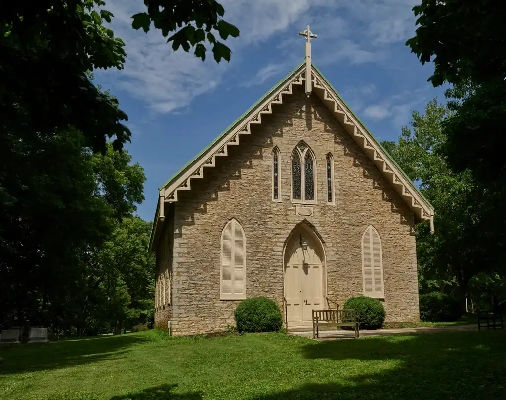 Stone country church with a tall gabled roof
